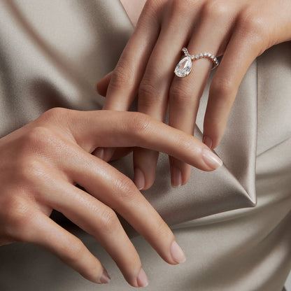 Tear curve diamond ring